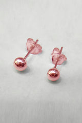 أقراط فضية على شكل كرة