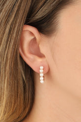 أقراط دائرية من اللؤلؤ الفضي