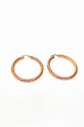 أقراط فضية دائرية كبيرة ملتوية