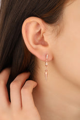 أقراط فضية متدلية