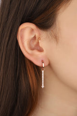 White Baguette Stone Dangling Silver Arrow Earrings