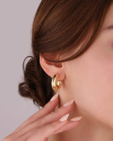 أقراط دائرية فضية منقوشة بدون حجارة