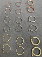 أقراط فضية دائرية مصنوعة من الأسلاك